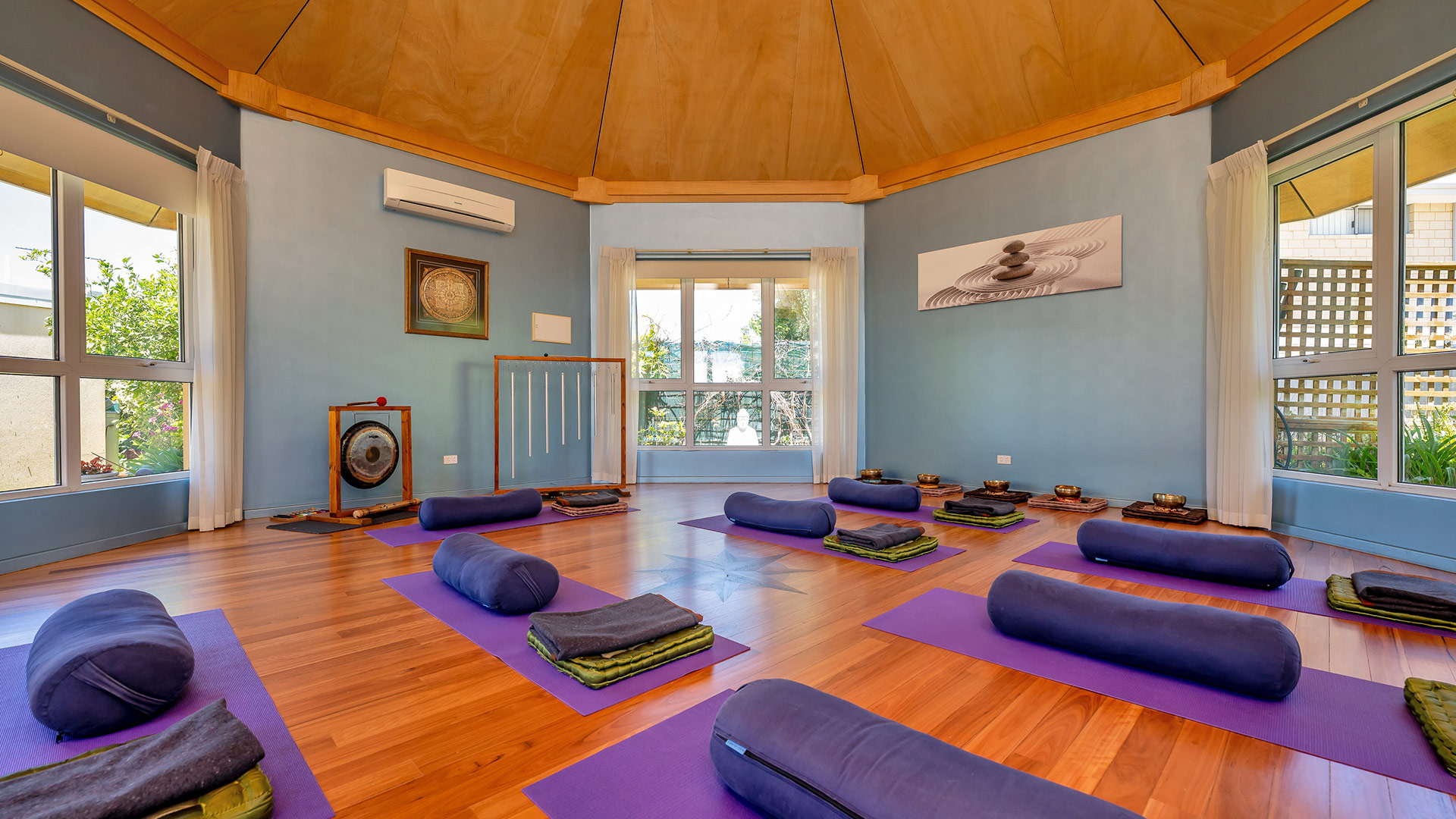pilates room with purple matts and pilates cushions in a dedicated venue room