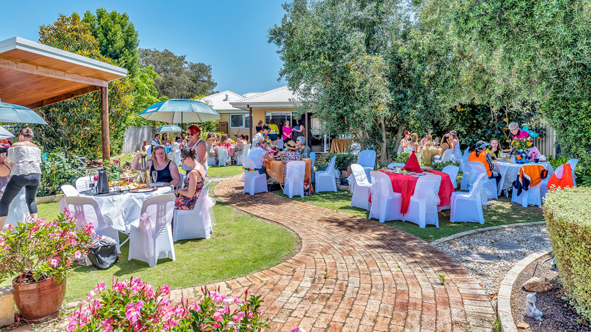 women's party event in Mandurah with outside tables, flowers, and decoractions